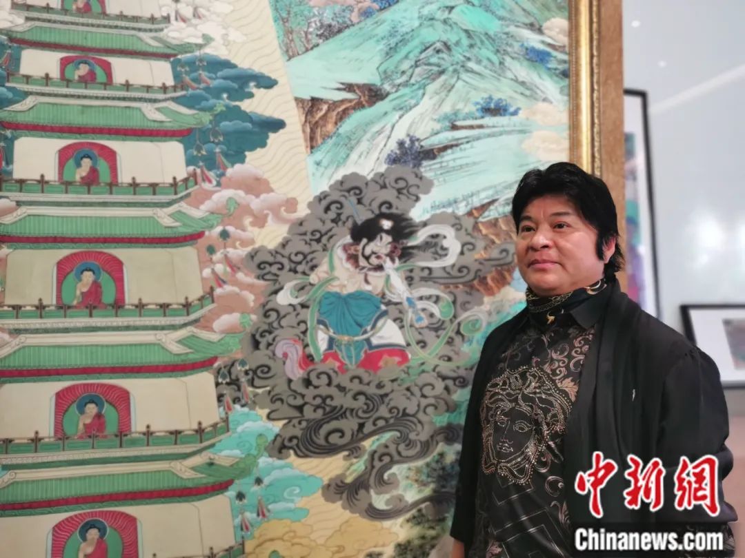 國家一級美術(shù)師劉觖。張?zhí)砀?攝